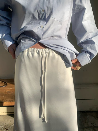 Satin mini bell skirt