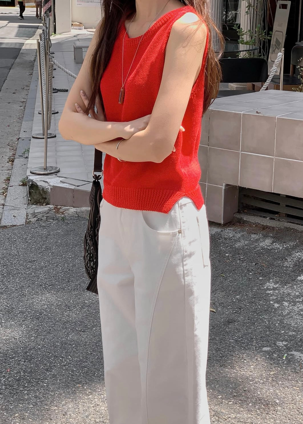 Sleeveless vented knit top
