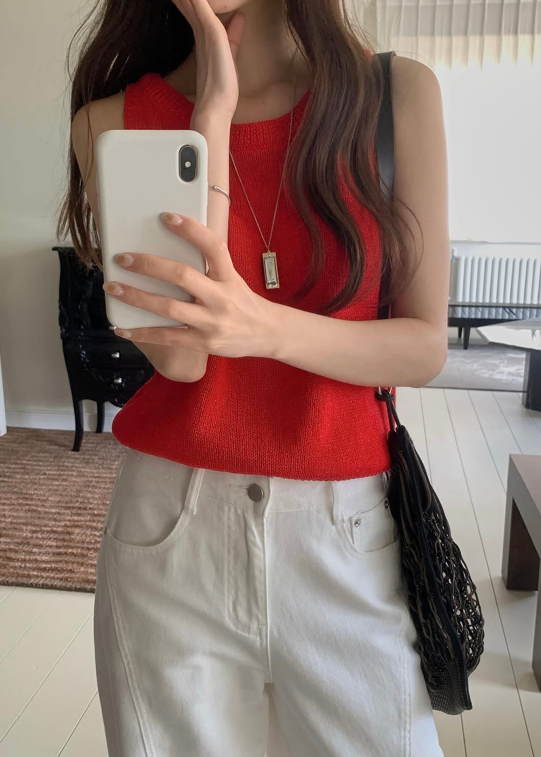Sleeveless vented knit top