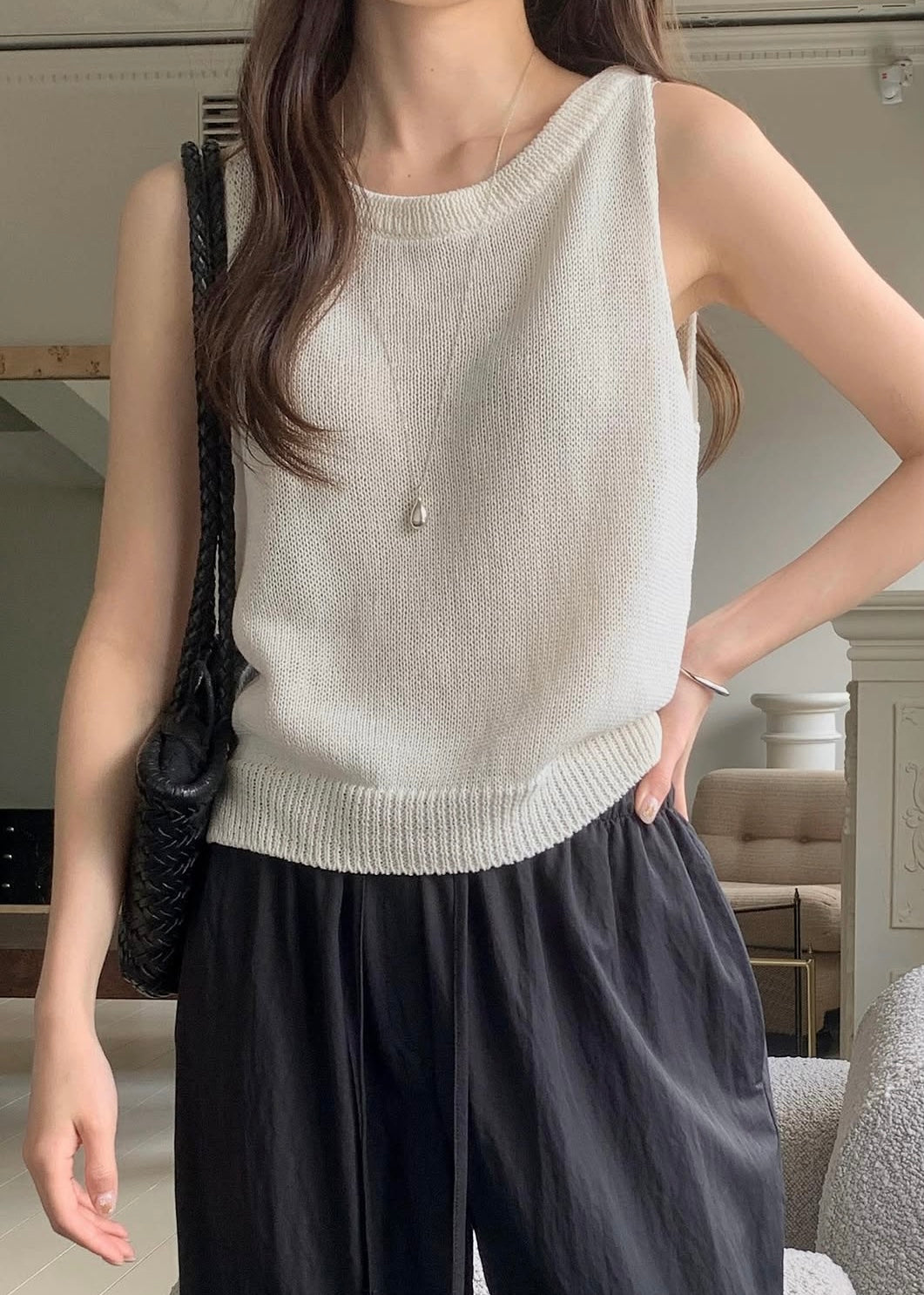 Sleeveless vented knit top