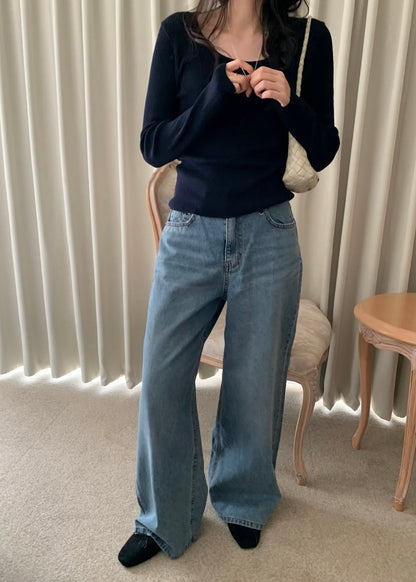 Loosen whiskers indigo jeans