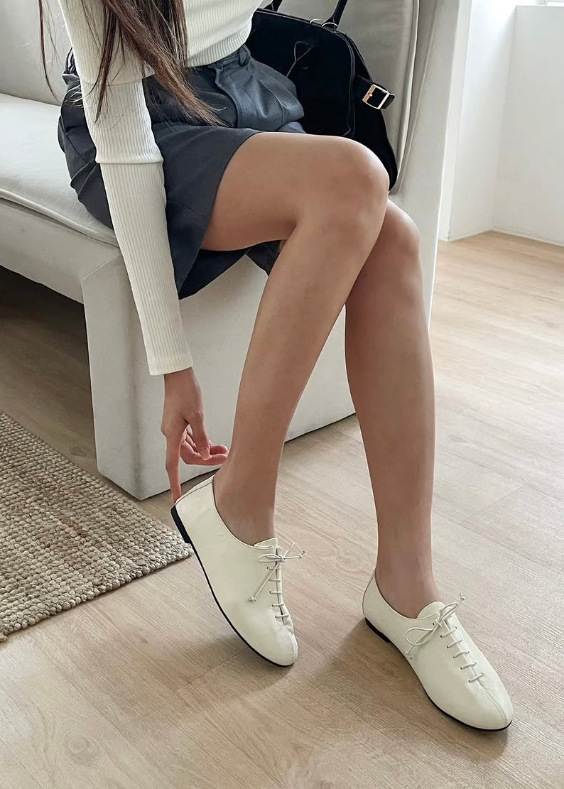 Lace-up ballet shoes
