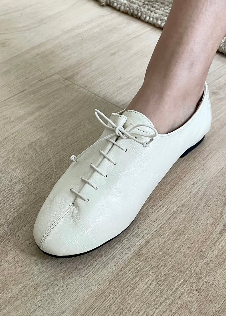 Lace-up ballet shoes