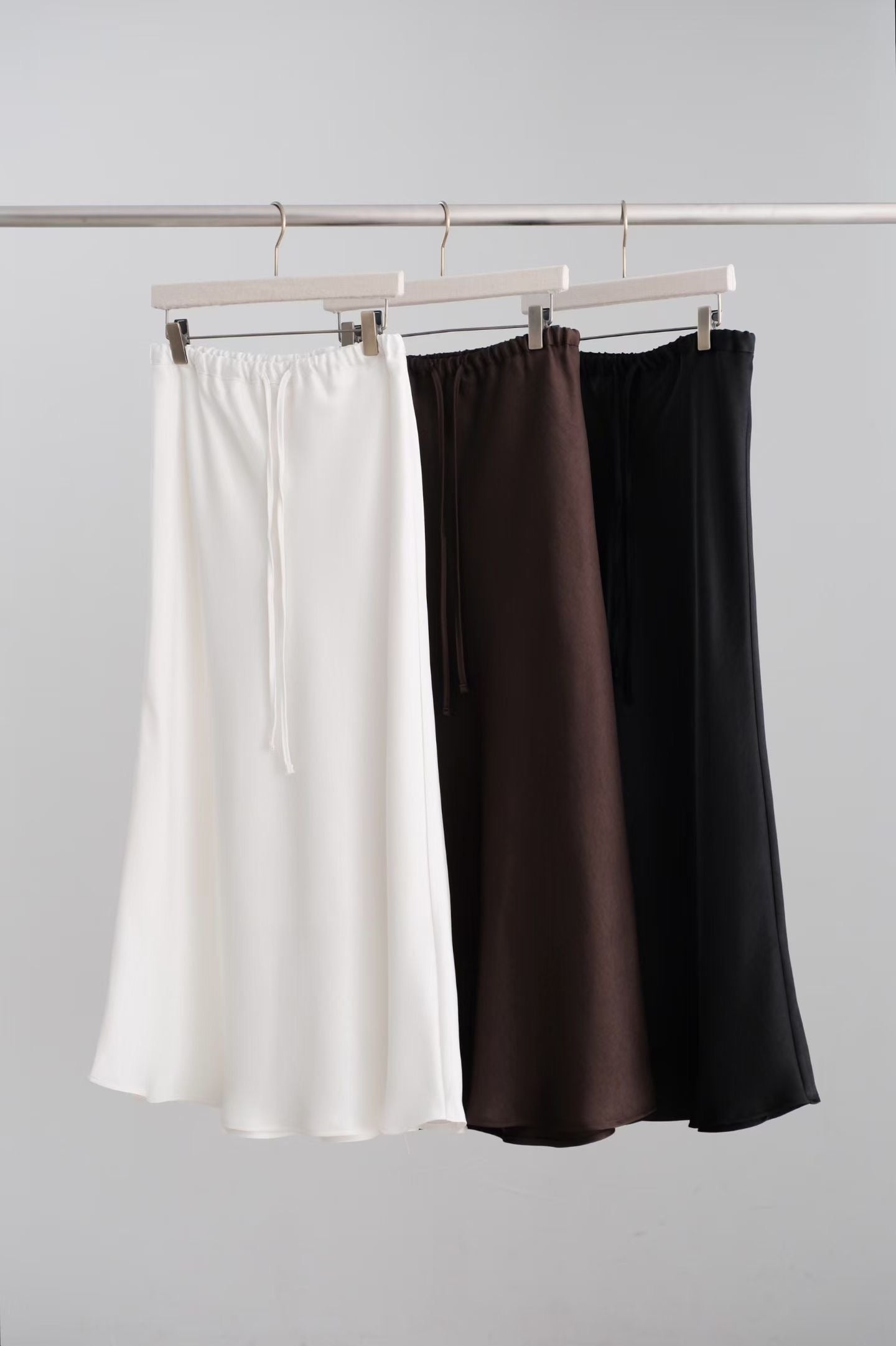 Satin mini bell skirt